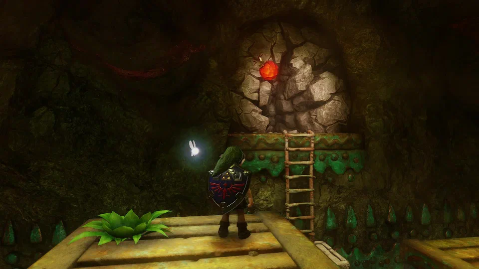 Young Link with the Hylian Shield on his back standing on a wooden platform inside Dodongo's Cavern, facing a cracked rock wall with a glowing red Bomb Flower set into it, a ladder to the right and teal crystal spikes below