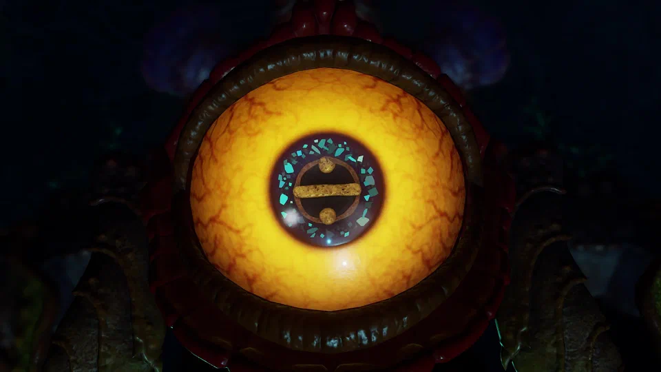 Extreme close-up of Queen Gohma's single enormous eye: yellow-orange and red-veined, a dark ringed pupil flecked with teal crystal, framed by red armored plating and ridged teeth-like edges