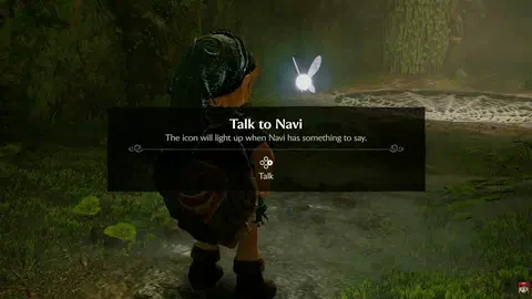 Inside the Great Deku Tree, a tutorial box reads: Talk to Navi. The icon will light up when Navi has something to say. A D-pad icon shows Talk mapped to right.