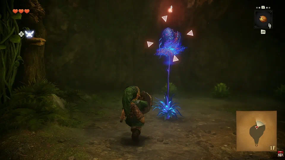 The Deku Baba frozen upright and glowing electric blue after being hit by a Deku Nut, still framed by the lock-on reticle