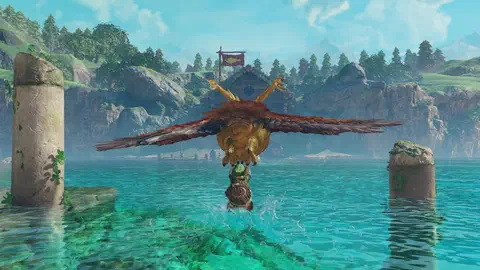 A huge brown owl with horn-like feather tufts lifting young Link out of Lake Hylia by its talons, turquoise water splashing below, two stone pillars either side and the Fishing Pond hut with its fish flag behind