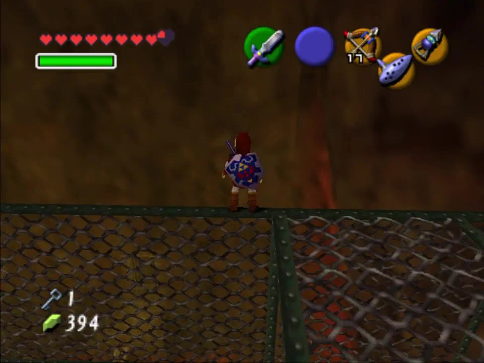 Climb up the metal wall to the pushable block