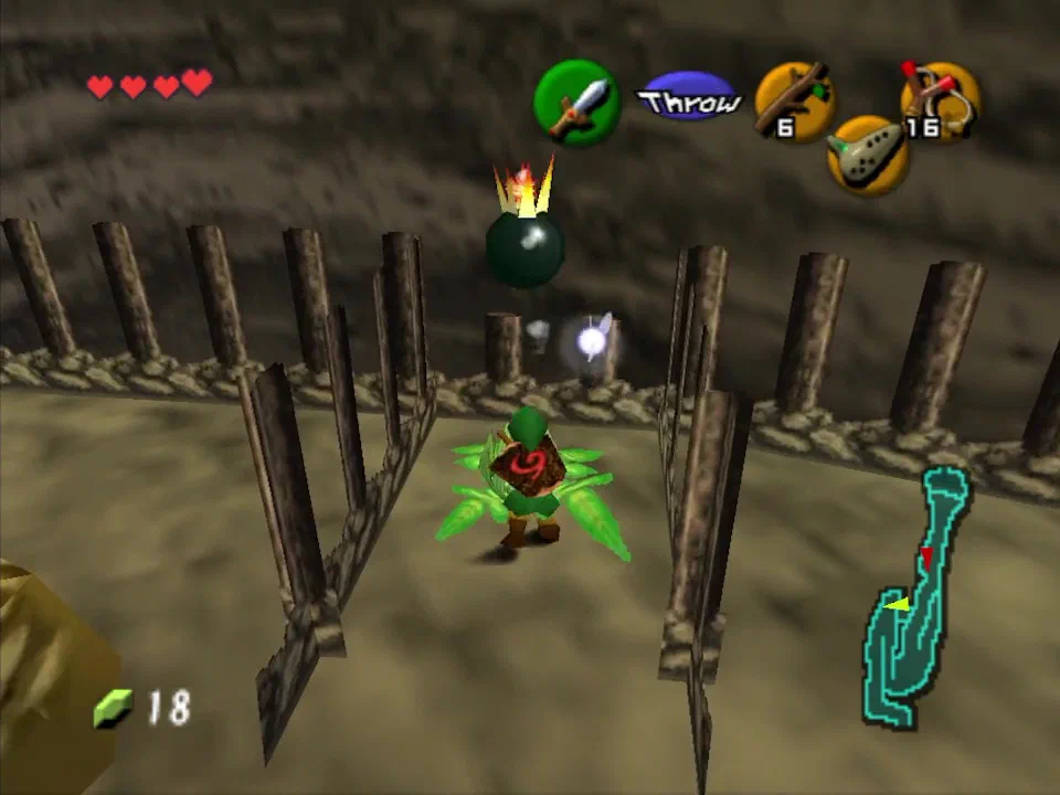 Throw a bomb off this ledge to break the rock blocking Dodongo's Cavern