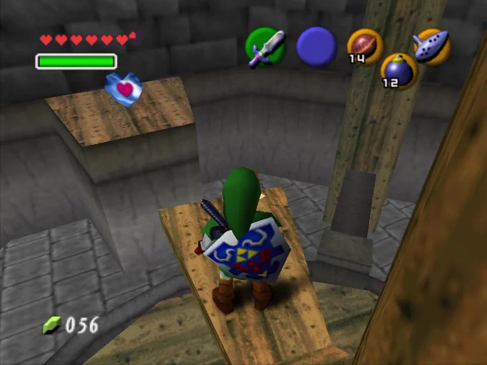 Carefully jump across the platform to grab the heart piece
