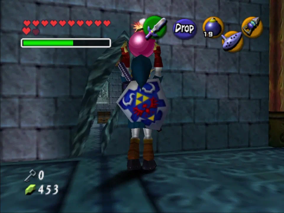 Float to the middle area of where you saw Princess Ruto and bomb the wall to get the key
