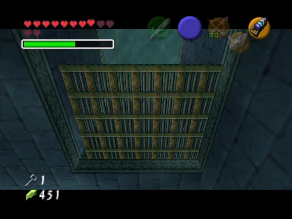 After killing the enemies in the room under the center pillar room, float up the newly open grate and grab the small key